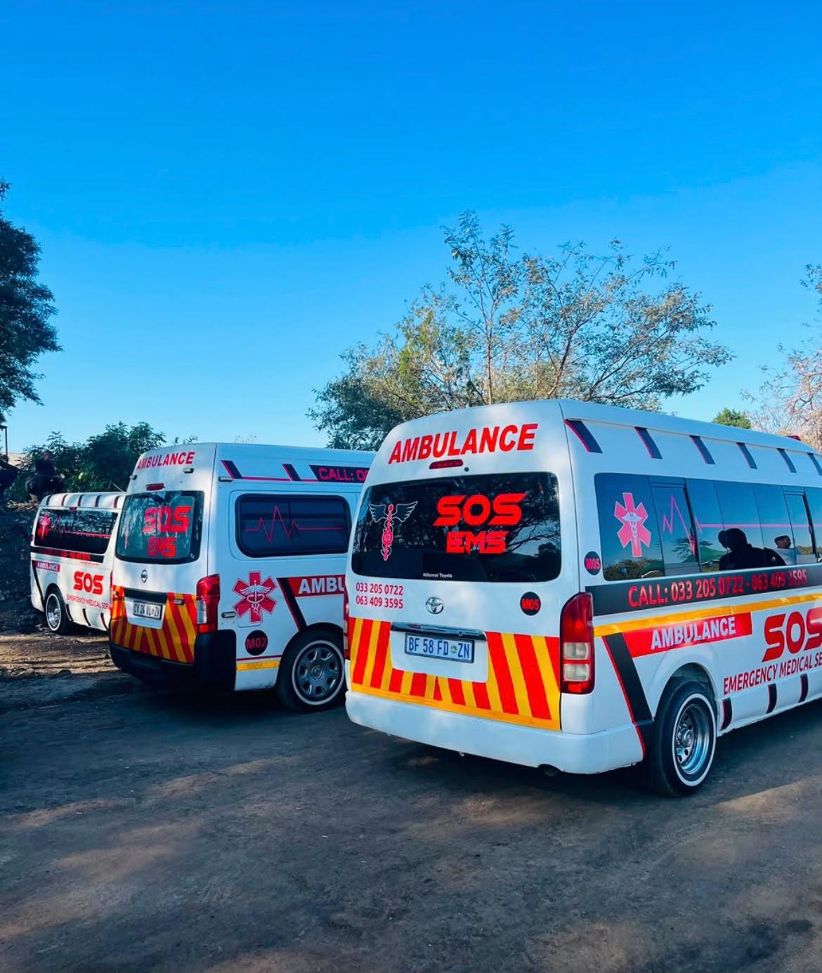 SOS EMS ambulance fleet parked at base